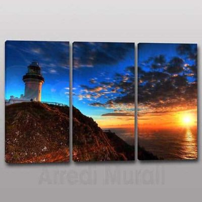 Quadri moderni faro 3 tele con tramonto sul mare