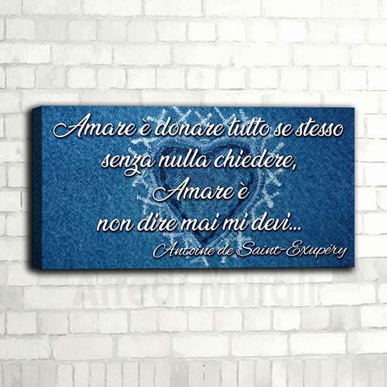 frase su quadro moderno riporta famosa citazione di Antoine de saint exupéry