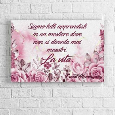 Quadro con fiori e frase di Hemingway su tela
