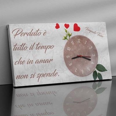 Orologio da parete con frase su tela