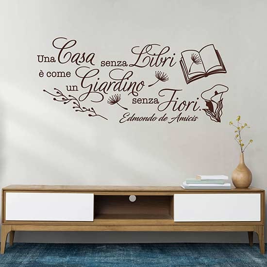 Frase adesiva da muro sui libri