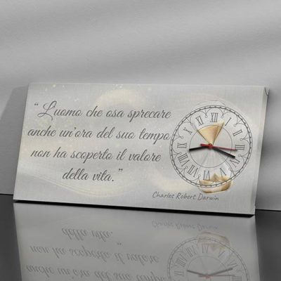 Orologi da parete con frase di Darwin su tela