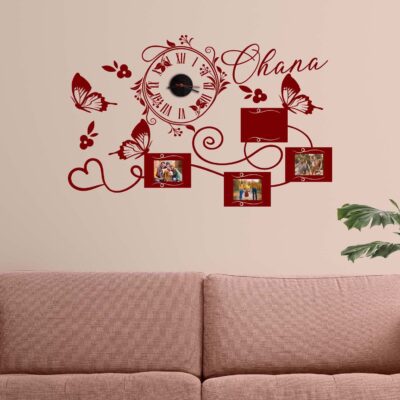 Decorazione murale Ohana con orologio centrale, farfalle e cornici foto adesive.