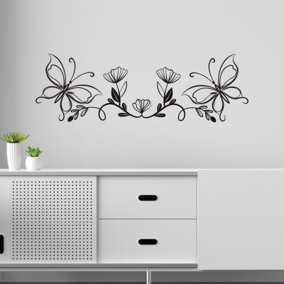 Dona stile ed eleganza alla parete con l’Adesivo Murale Decorativo con Farfalle: perfetto per un soggiorno moderno e raffinato.