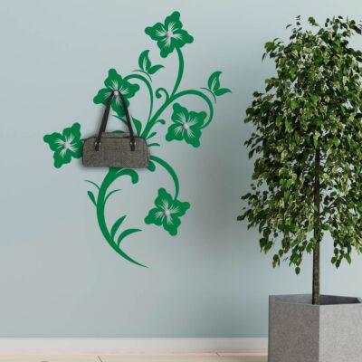 Appendiabiti fiori adesivi da muro con dettagli verdi su sfondo chiaro, una soluzione pratica e decorativa per ogni ambiente.